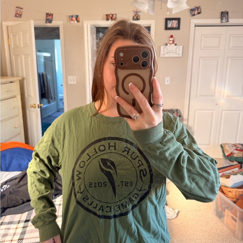 Green Long Sleeve Graphic Tee with Black Emblem